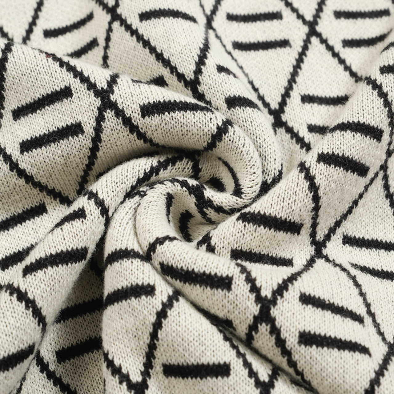 Polo en tricot noir jacquard brodé pour homme