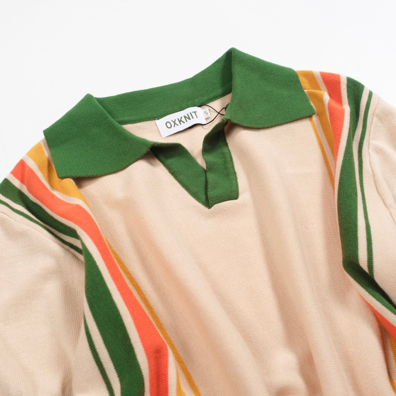 Polo tricoté vintage rayé vert pour homme