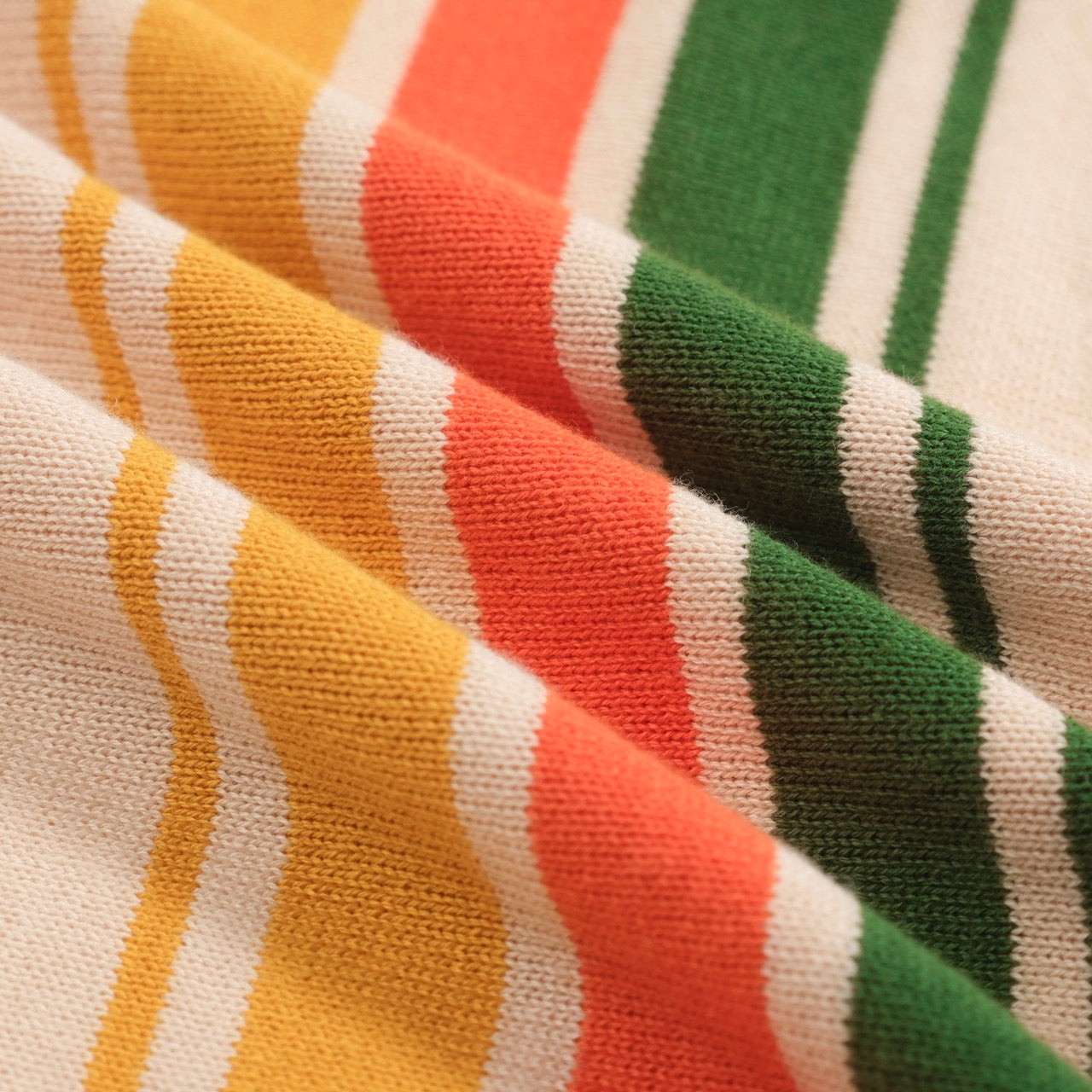 Polo tricoté vintage rayé vert pour homme