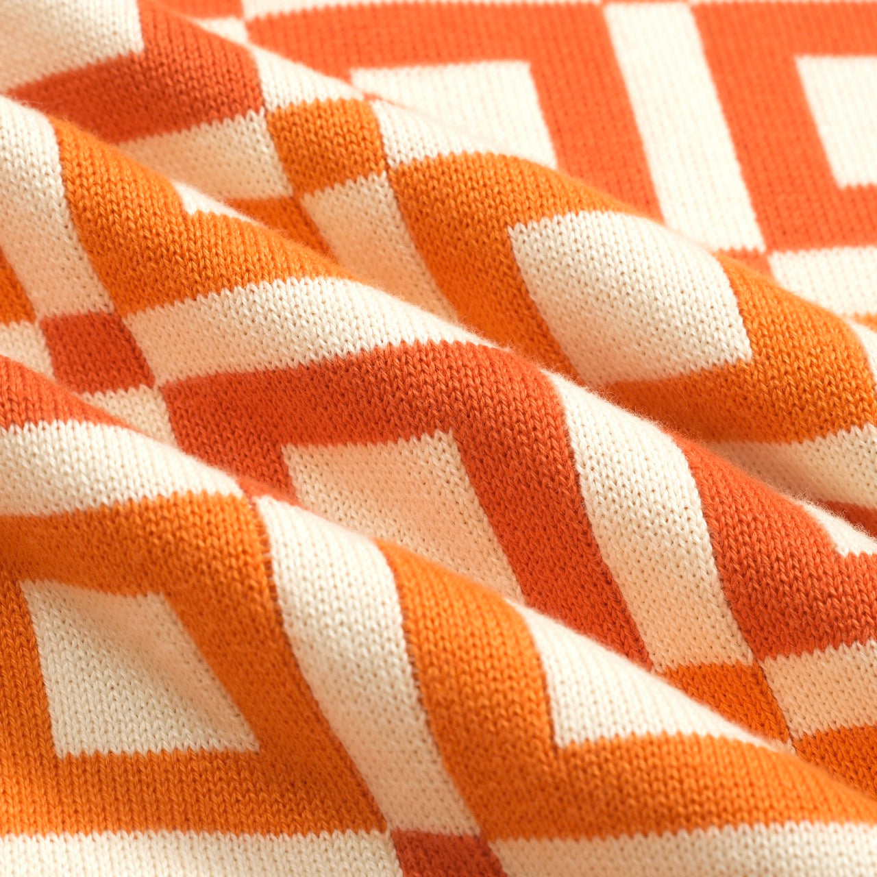 Polo en tricot vintage jacquard orange pour homme