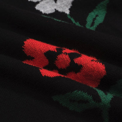 Polo en tricot vintage noir pour hommes à col en V floral