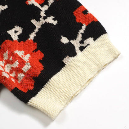 Polo tricoté rétro à col en V floral noir pour hommes