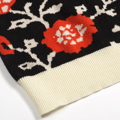 Polo tricoté rétro à col en V floral noir pour hommes