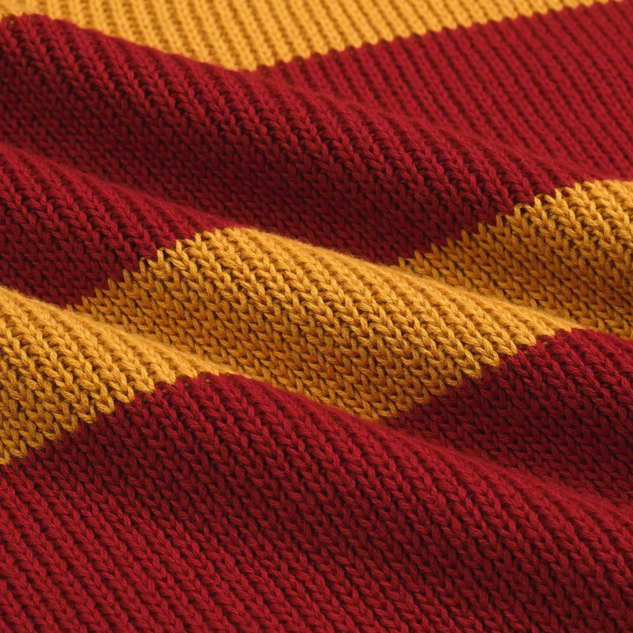 Polo tricoté vintage rouge à rayures pour hommes