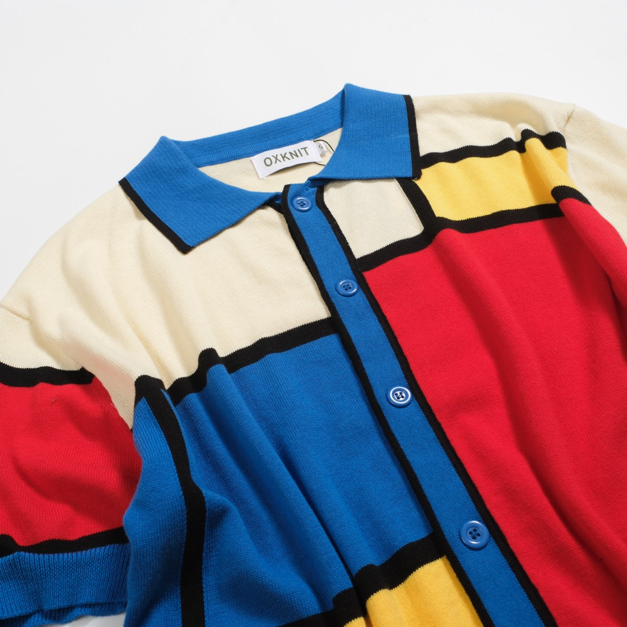 Cardigan tricoté rétro coloré pour hommes en bleu