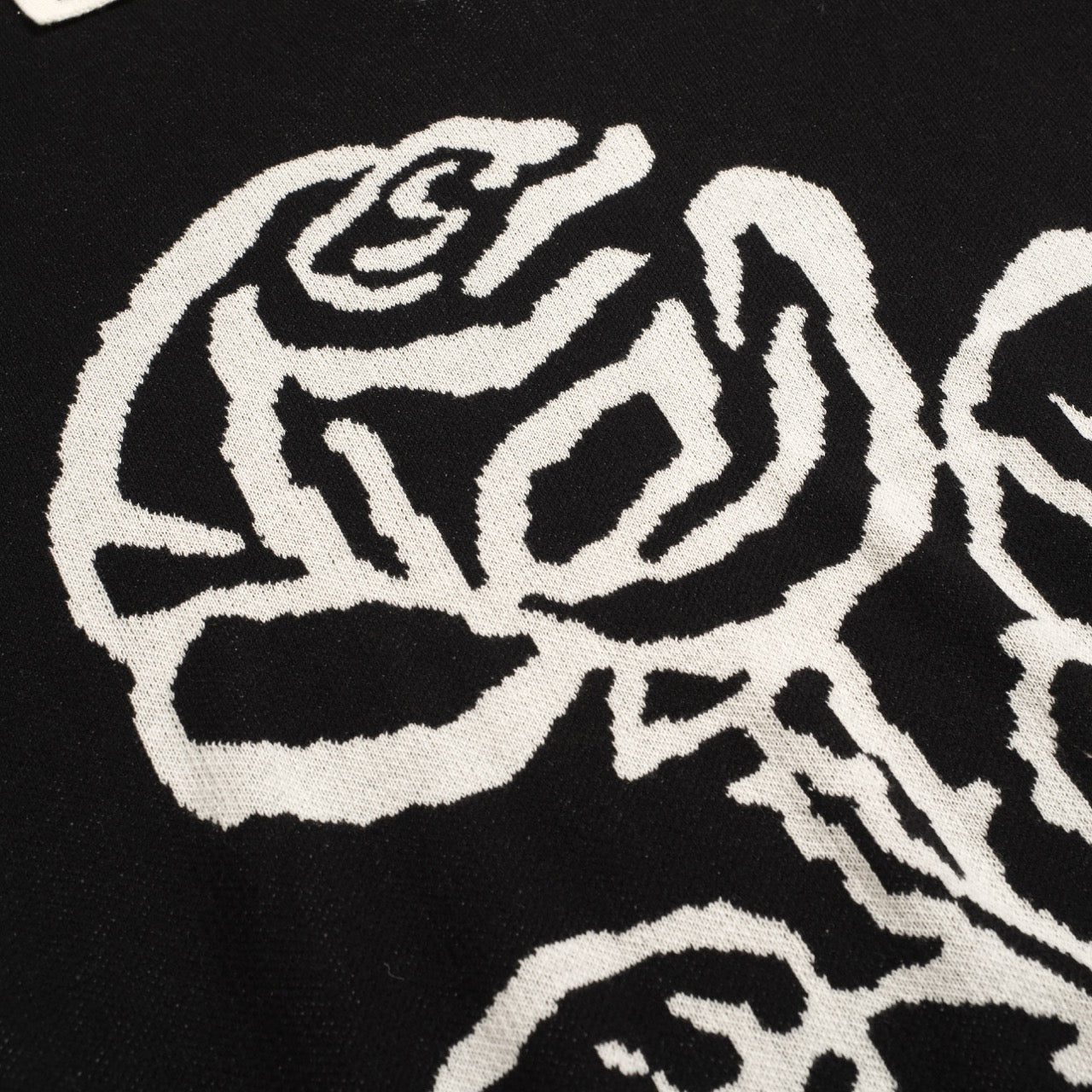 Polo tricoté vintage noir avec jacquard pour homme