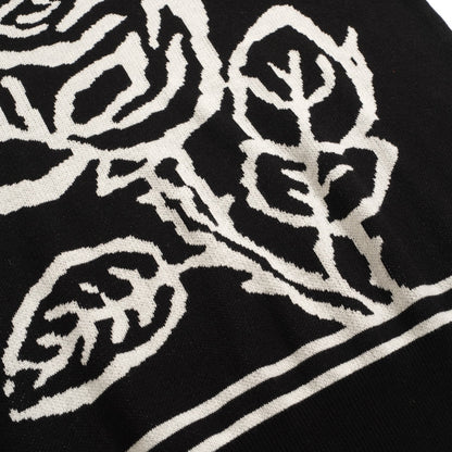 Polo tricoté vintage noir avec jacquard pour homme