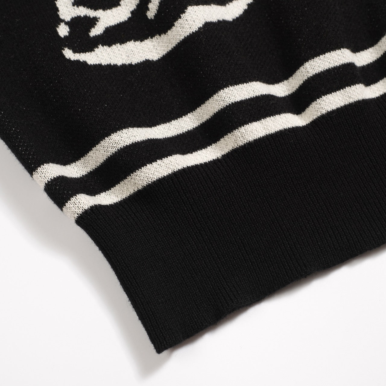 Polo tricoté vintage noir avec jacquard pour homme