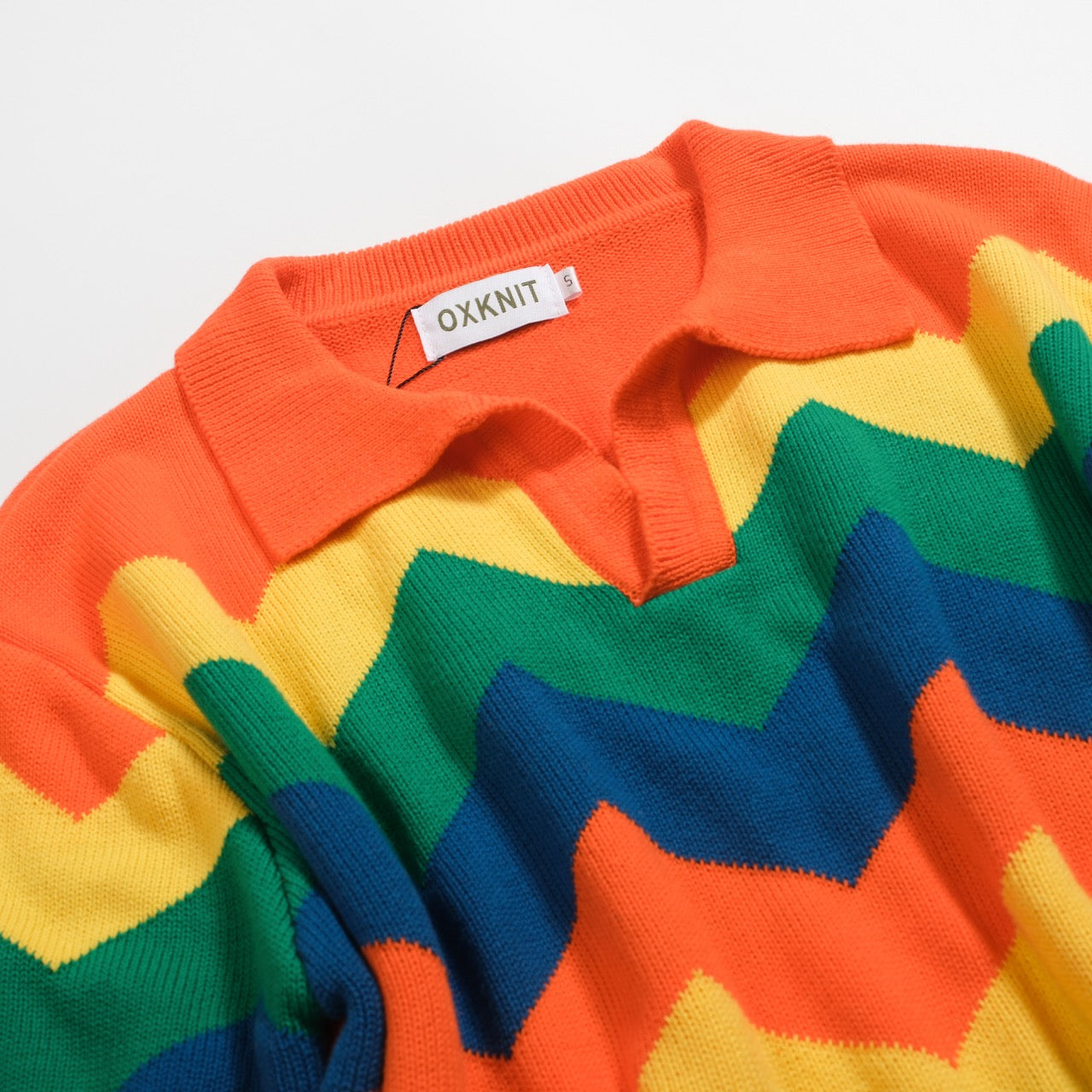 Polo tricoté vintage à col en V pour hommes orange jacquard