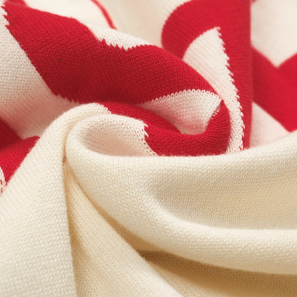 Polo tricoté à col en V pour hommes en abricot blanc 1976