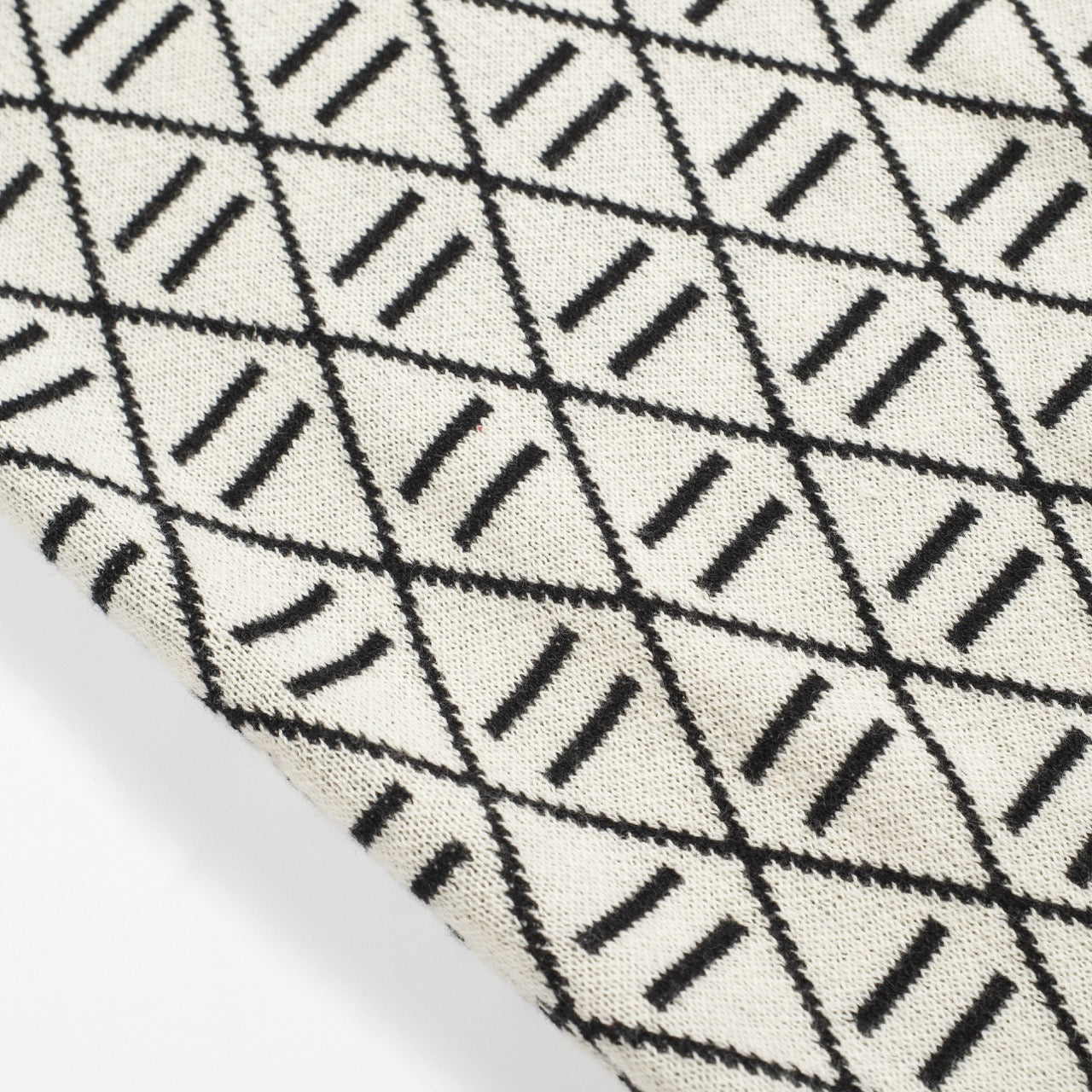 Polo en tricot noir jacquard brodé pour homme