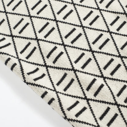 Polo en tricot noir jacquard brodé pour homme