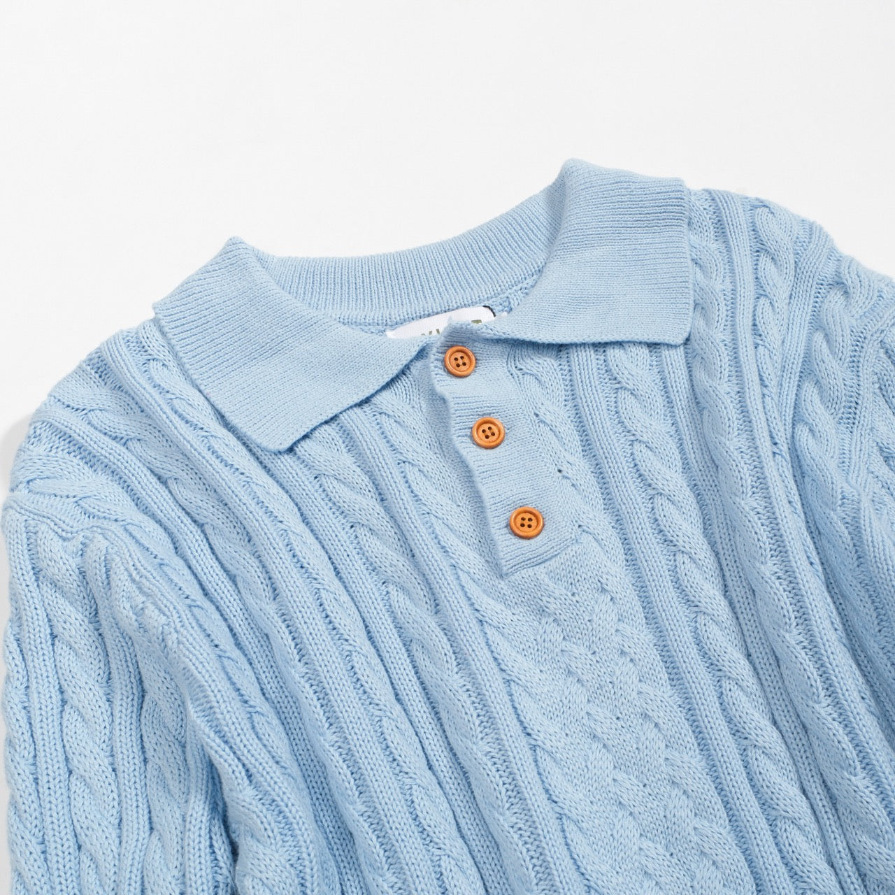 Polo tricoté texturé bleu à la mode pour hommes